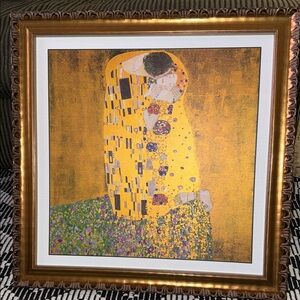 21.5”X21.5” print of Gustav Klimt’s “The Kiss” in gold frame